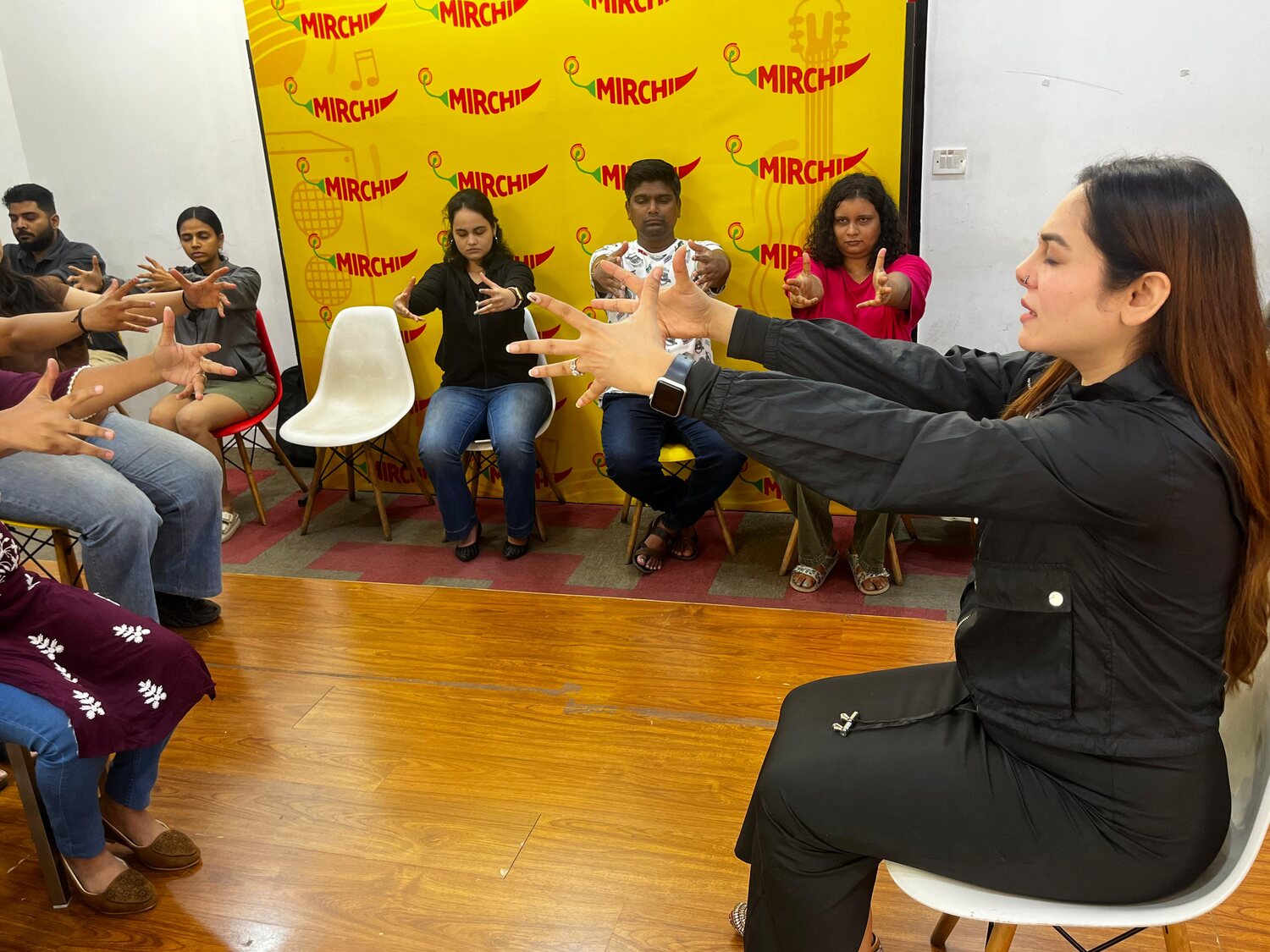 Vibha Jain leading a group hypnotherapy and relaxation session in Mumbai